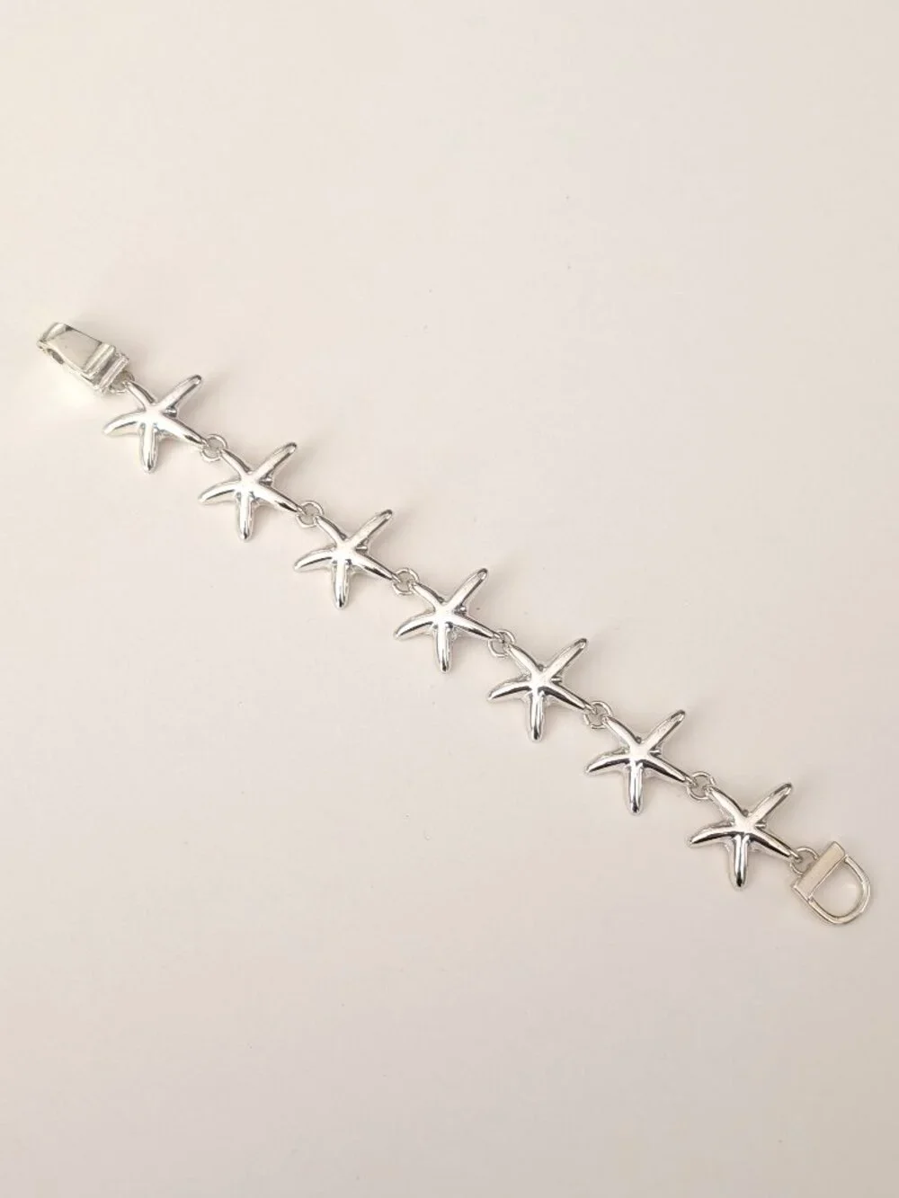 Silver starfish magnetic closure bracelet